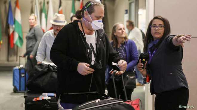  Long Waits, Panic at US Airports Under New COVID Regulations
