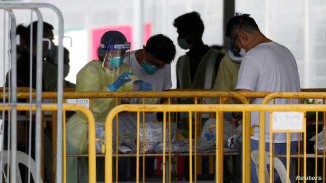  Singapore Posts Record Number of New Coronavirus Cases